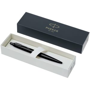 A sleek black metal pen rests in an open presentation box, featuring a simple logo on the lid.