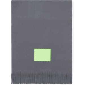 A grey polar scarf with fringe detailing and a patch of green fabric. It features a logo on the patch.