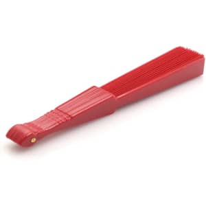 A red hand fan with a pleated design and a curved handle, ideal for leisure activities.