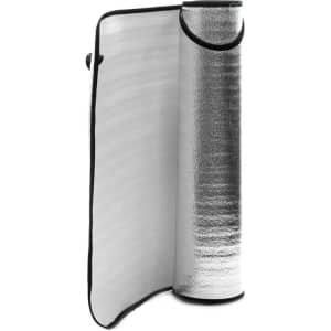 A rolled silver sunshade with a black edge, designed for outdoor use, is partially unrolled.