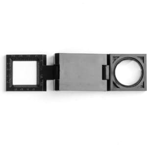 A black magnifier with a rectangular lens and a circular lens, featuring measurement markings on the side.