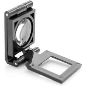 A black magnifier with a large lens and a rectangular base, designed for close-up viewing.