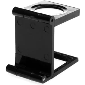 A black magnifier with a foldable stand, designed for close-up viewing of small text or details.