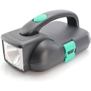 A handheld black flashlight with a green handle and button, featuring a clear lens and a secure latch.
