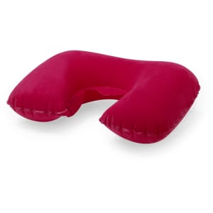 A travel pillow in vibrant red with a U-shaped design, featuring a soft, inflatable surface and a logo.
