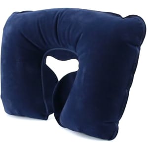 A navy blue travel pillow with a unique shape and a cut-out for comfort. It features a soft texture and has a branding logo.