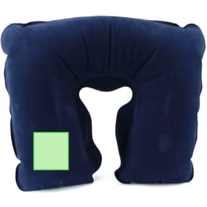 A navy blue travel pillow with a unique shape featuring a cut-out section for support. It includes a logo on the side.