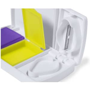 Aspirin pillbox in white with purple and yellow compartments, featuring a built-in knife for cutting pills.