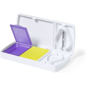Aspirin pillbox in white with a purple and yellow compartment, featuring a hinged lid and a small pill cutter.