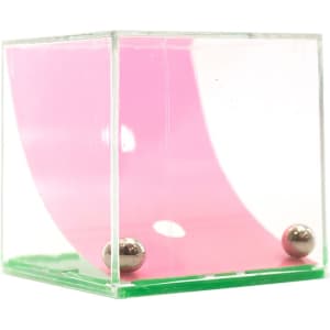 A clear cube containing a pink curved strip and two silver balls at the base. It features a logo on the side.
