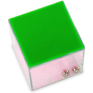 A translucent cube with a vibrant green top and a pink base, featuring two metallic balls on the bottom.