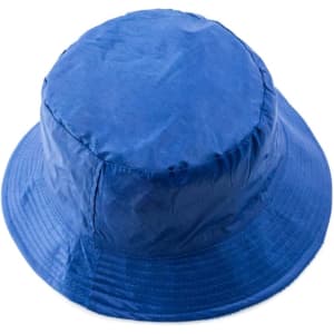 A blue reversible bucket hat with a textured finish and a logo on the side.