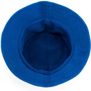A blue reversible bucket hat with a soft interior and a visible logo.