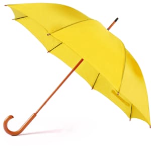 A yellow umbrella with a brown wooden handle, featuring a curved hook design and sleek canopy.