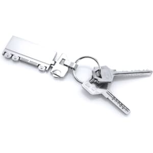 A silver trailer-shaped keyring with a keyring attachment and two keys.
