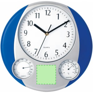 A blue and silver wall clock with a white face, featuring temperature and humidity gauges.