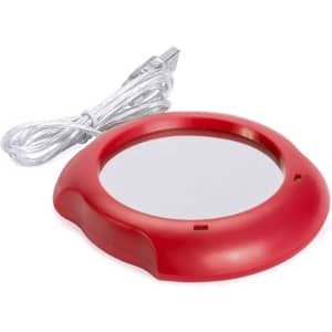 A red mug warmer with a silver heating surface and a USB power cable.