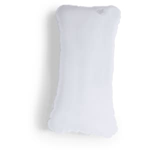 A white Cancún Pillow with a scalloped edge and a logo on one corner, ideal for home decor.