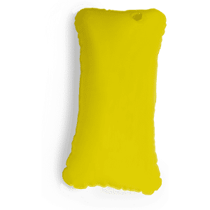 A bright yellow pillow with a soft, rounded edge and a small hole for inflation.