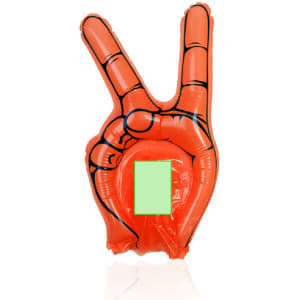 An inflatable orange hand displaying a peace sign, featuring a blank green panel in the centre.