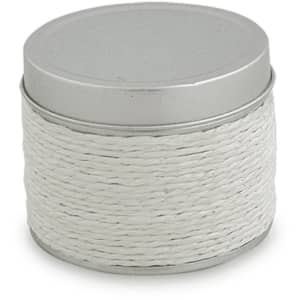 A round, silver tin candle with a textured white woven exterior. The lid is smooth and metallic.