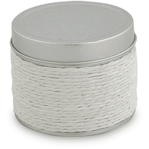 A round, white aromatic candle in a tin container with a silver lid and textured rope detailing around the base.