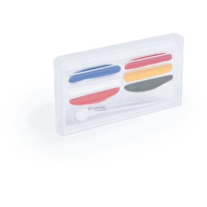 A rectangular, transparent case containing red, blue, yellow, grey, and white paint with a paintbrush.