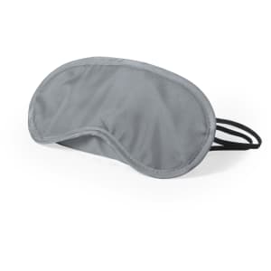 A grey travel eye mask with an elastic strap, featuring a simple design and soft fabric.