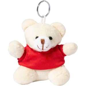 A cream teddy bear keyring wearing a red shirt. Equipped with a keychain attachment, the bear has a friendly smile.