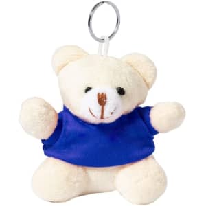 A fluffy cream teddy bear keyring wearing a blue shirt, attached to a metal keyring.