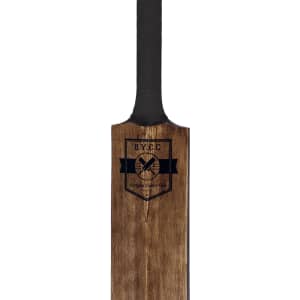 A wooden cricket bat with a black grip and a logo on the blade.
