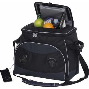 A black and grey cooler bag with two speakers, filled with fruits and beverages, featuring a shoulder strap and a zippered top.