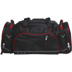 A black duffle bag with red accents and multiple compartments, featuring zippers and handles.