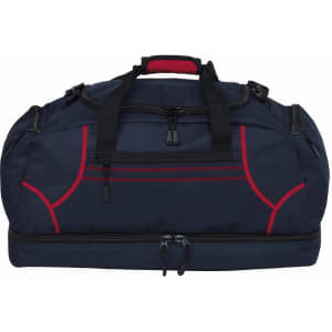 A duffle bag in navy blue with red accents, featuring multiple zippers and handles, and a branded logo.