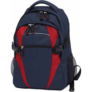 A Spliced Zenith Backpack in navy blue and red with multiple compartments and a mesh side pocket. It features a logo.