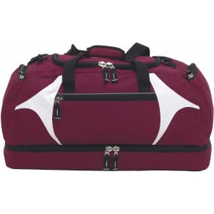 A maroon duffle bag with white accents, featuring multiple zippered compartments and a logo.