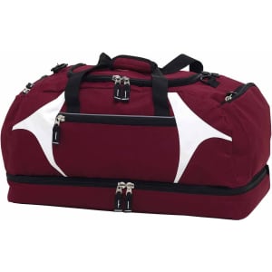 A maroon duffle bag with white accents and multiple zipper compartments, featuring a logo.