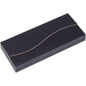 A sleek black gift box with a wavy design on the top, suitable for packaging kitchenware or gourmet items.