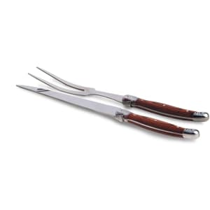 A stainless steel Bordeaux carving set with wooden handles, featuring a carving knife and fork, both elegantly designed.