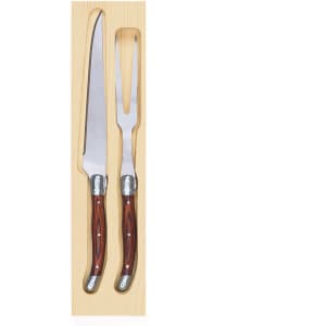 A Bordeaux carving set featuring a knife and fork with wooden handles, presented in a wooden box.