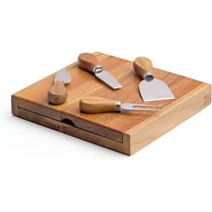 A wooden clamshell cheese board with four stainless steel cheese knives, featuring a natural wood finish.