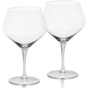 A glass set featuring two clear, stemmed wine glasses with a wide bowl design.