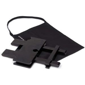 A black folding table with a carry bag, suitable for outdoor leisure activities. It has a simple design and sturdy construction.