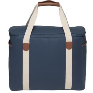A navy cooler bag with cream straps and leather accents, featuring a zippered top and side pockets.