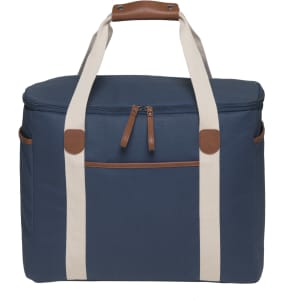 A navy cooler bag with a zippered top, cream handles, and brown leather accents. It features a front pocket and a logo.