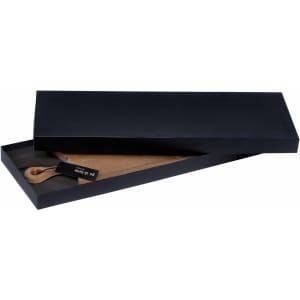 A wooden serving board in a black gift box, featuring a handle and branded tag.