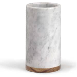 A drink bottle cooler made of white marble with a wooden base, featuring a smooth, polished finish.