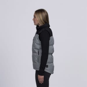 A grey and black puffa vest with a high collar, featuring a branding logo, viewed from the side.