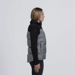 A side view of a grey and black smpli Axle Puffa Vest with a zippered pocket and a logo.