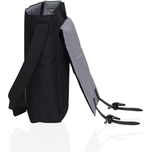 A black messenger bag with a striped interior and adjustable straps, featuring a flap closure and branding.